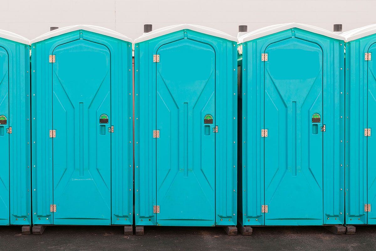 Industrial portable restroom units at a plant in Mesquite, Texas